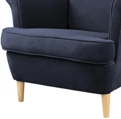 Fotel uszak Malmo granatowy w tkaninie Easy Clean na bukowych nóżkach