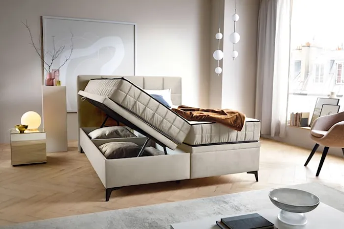 Łóżko kontynentalne 160x200 cm Beriano z pojemnikami i materacem jasnobeżowe welur