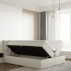 Łóżko kontynentalne 140x200 cm Carbini z pojemnikamii materacem bonellowym kremowe welur hydrofobowy