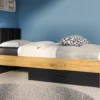 Łóżko młodzieżowe Colt ze stelażem i szufladą 90/200 cm dąb craft/czarny