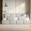 Łóżko młodzieżowe 90x200 cm Cloudy prawostronne z pojemnikiem i barierkami szarobeżowe boucle