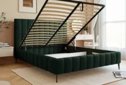 Łóżko tapicerowane 160x200 cm Fiarro z pojemnikiem na pościel ciemnozielone welur stelaż metalowy na wysokich nóżkach