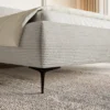 Łóżko tapicerowane 180x200 cm Roule Cord z pojemnikiem stelaż metalowy szarobeżowe sztruks nóżki czarne