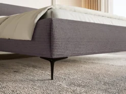 Łóżko tapicerowane 180x200 cm Roule Cord z pojemnikiem stelaż metalowy brązowe sztruks nóżki czarne
