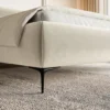 Łóżko tapicerowane 140x200 cm Roule kremowe welur hydrofobowy nóżki czarne