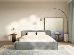 Łóżko tapicerowane 180x200 cm Tilves Slim z pojemnikiem stelaż metalowy szare welur