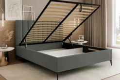 Łóżko tapicerowane 140x200 cm Veloro z pojemnikiem ciemnoszare welur stelaż metalowy na wysokich nóżkach