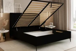 Łóżko tapicerowane 180x200 cm Veloro z pojemnikiem czarne welur stelaż metalowy na wysokich nóżkach