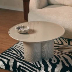 Stolik kawowy Roulness okrągły 80 cm jasnobeżowy wysoki połysk